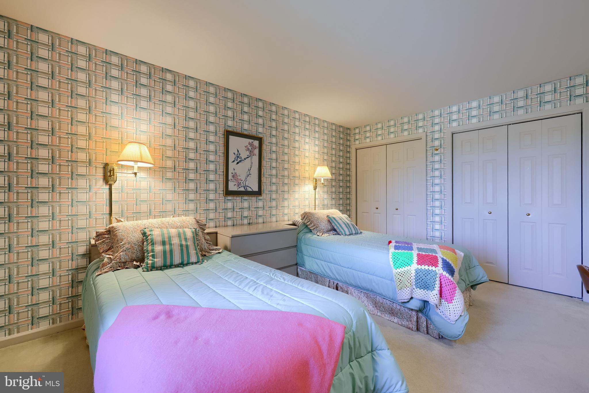 2018 Meadow Glen Reading, PA 19610 - Photo 38 of 46 a bedroom with a bed and a lamp