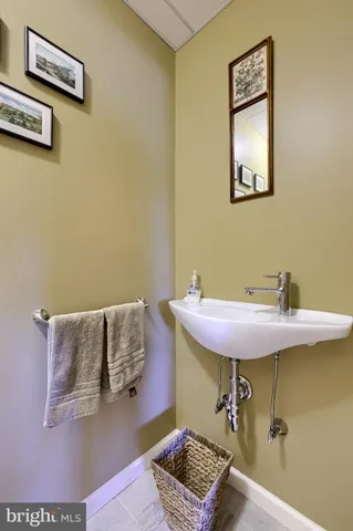 a view of a workspace with furniture and a workspace