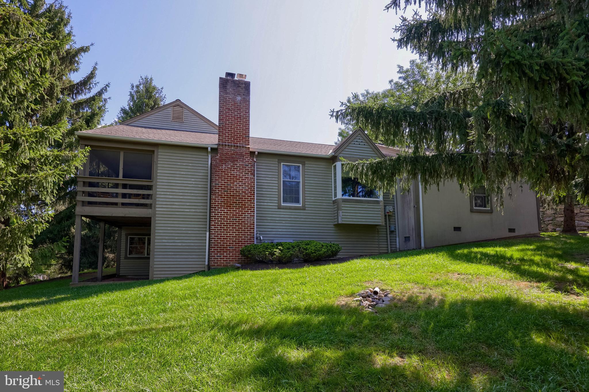 2018 Meadow Glen Reading, PA 19610 - Photo 5 of 46 a front view of a house with a garden