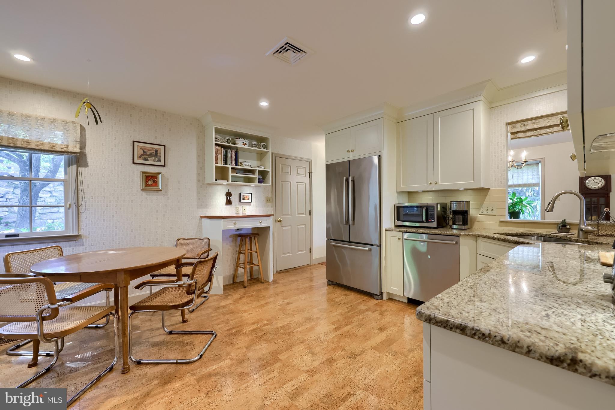 2018 Meadow Glen Reading, PA 19610 - Photo 6 of 46 a kitchen with refrigerator and chairs