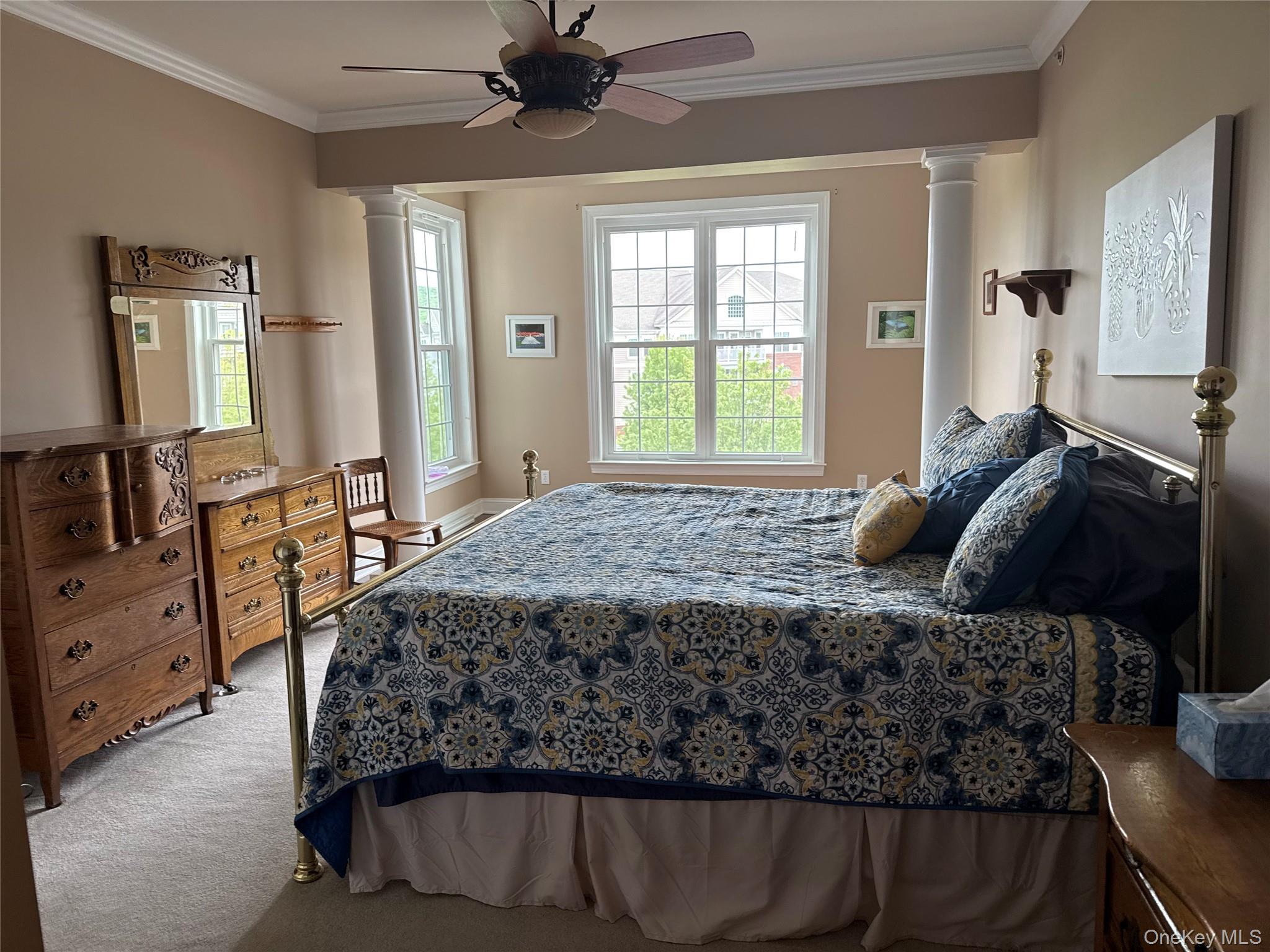 246 Regency Drive Fishkill, NY 12524 - Photo 13 of 20 a bed sitting in a bedroom next to a window