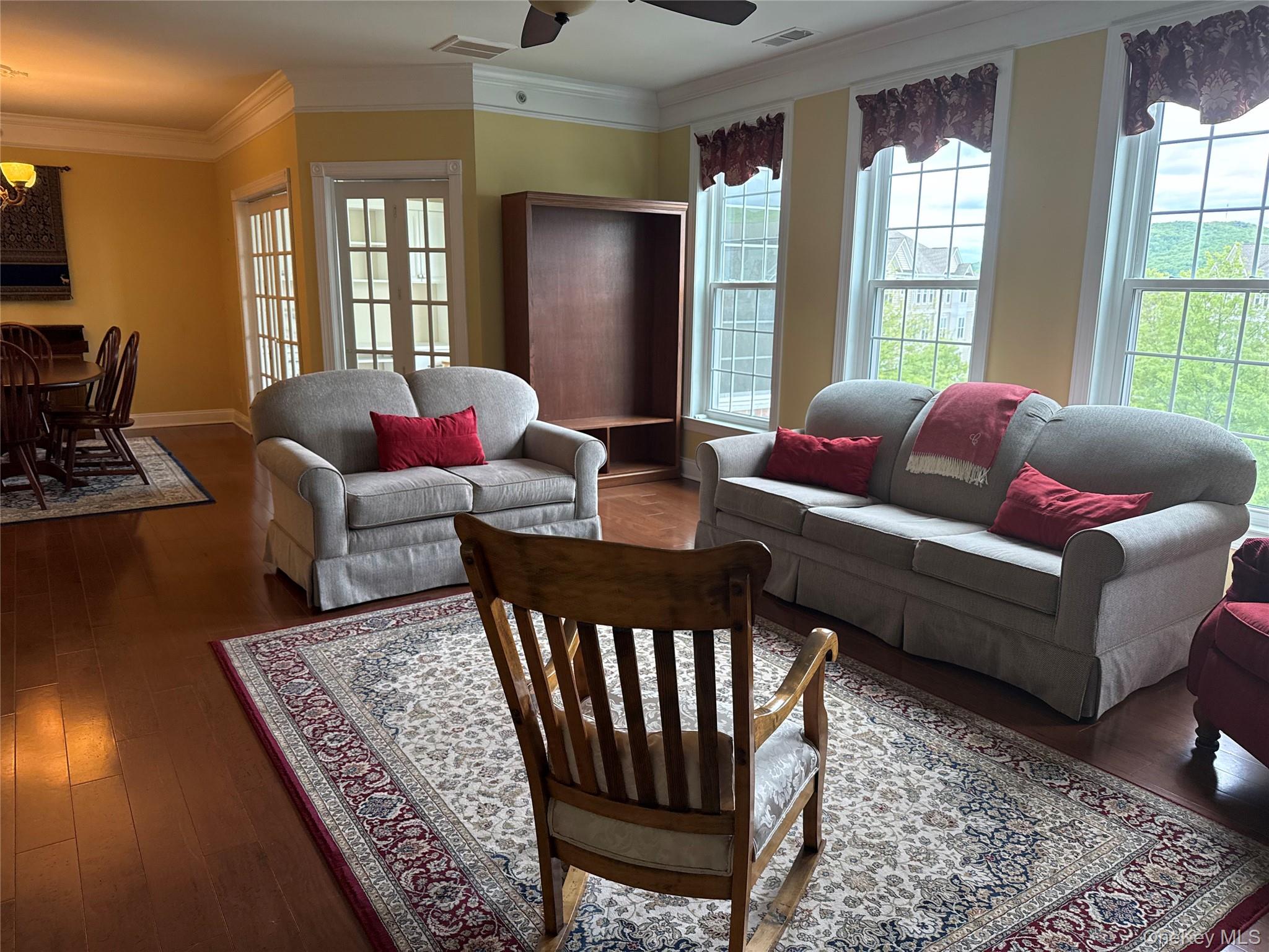 246 Regency Drive Fishkill, NY 12524 - Photo 5 of 20 a living room with furniture and wooden floor