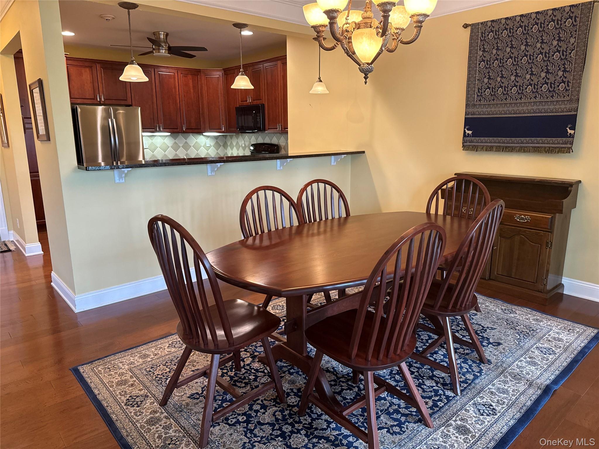 246 Regency Drive Fishkill, NY 12524 - Photo 8 of 20 a view of a dining room with furniture