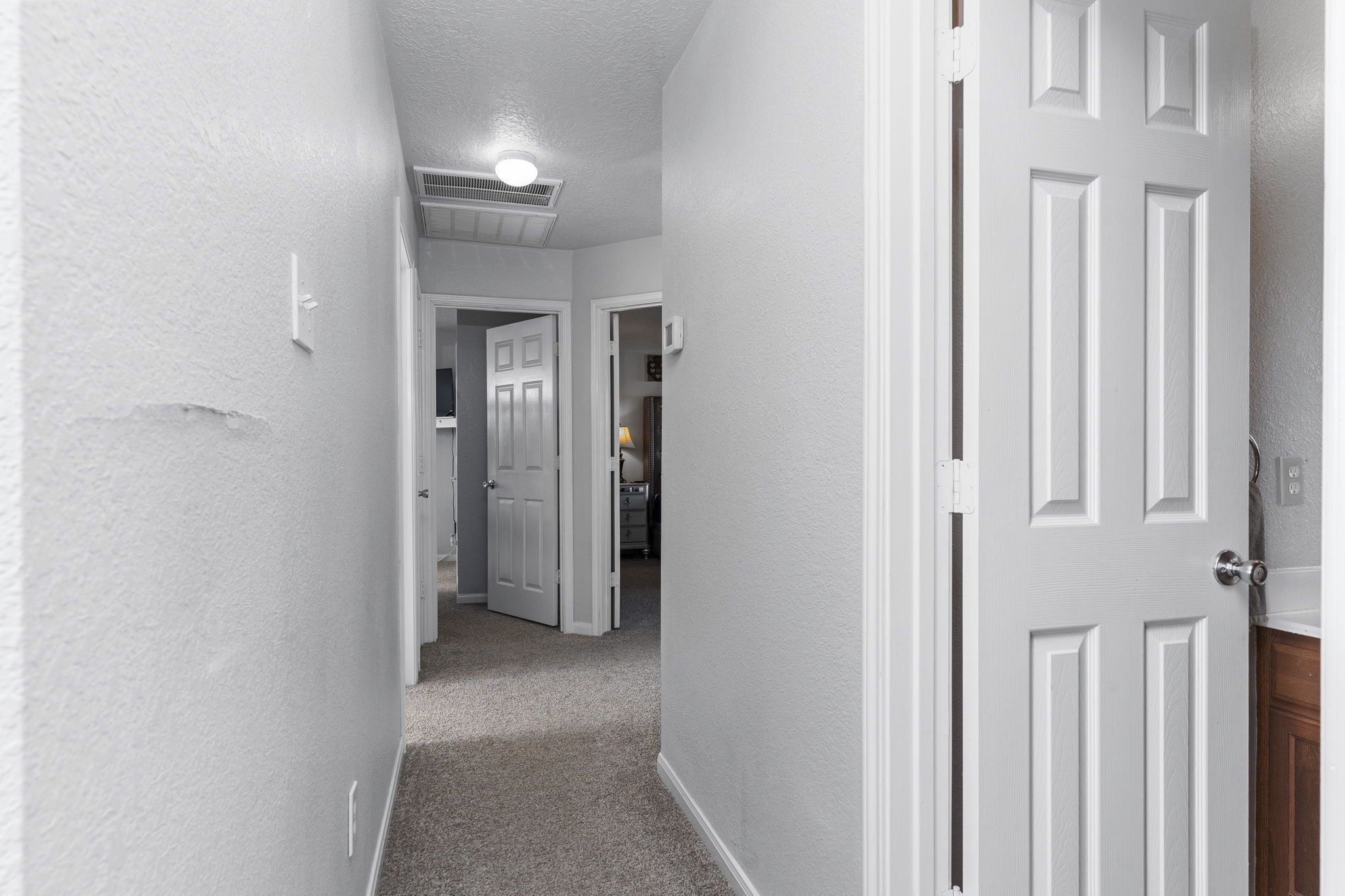 29326 Legends Green Drive Spring, TX 77386 - Photo 13 of 31 a view of a hallway with wooden floor