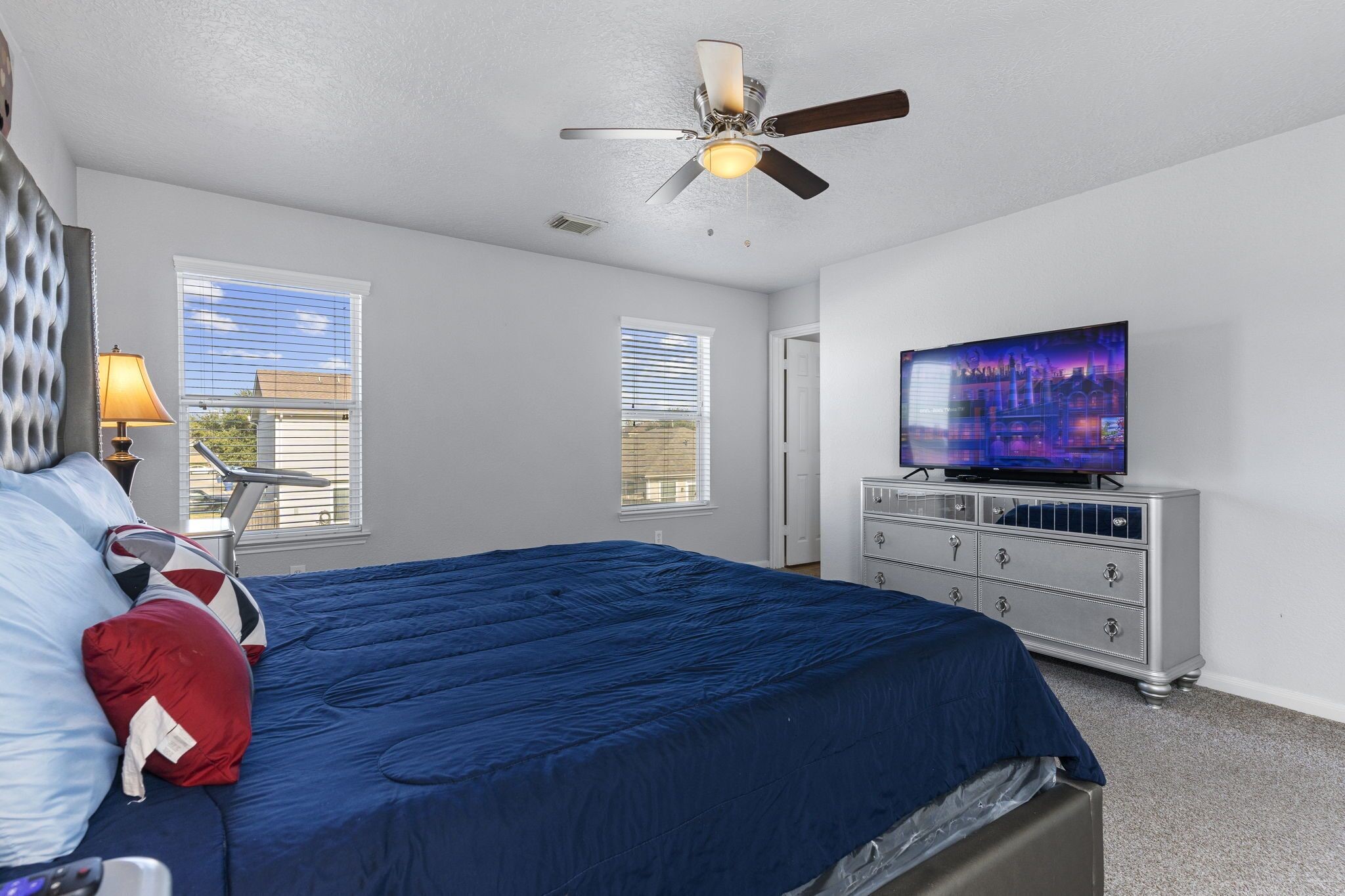29326 Legends Green Drive Spring, TX 77386 - Photo 14 of 31 a bedroom with a bed and wooden floor