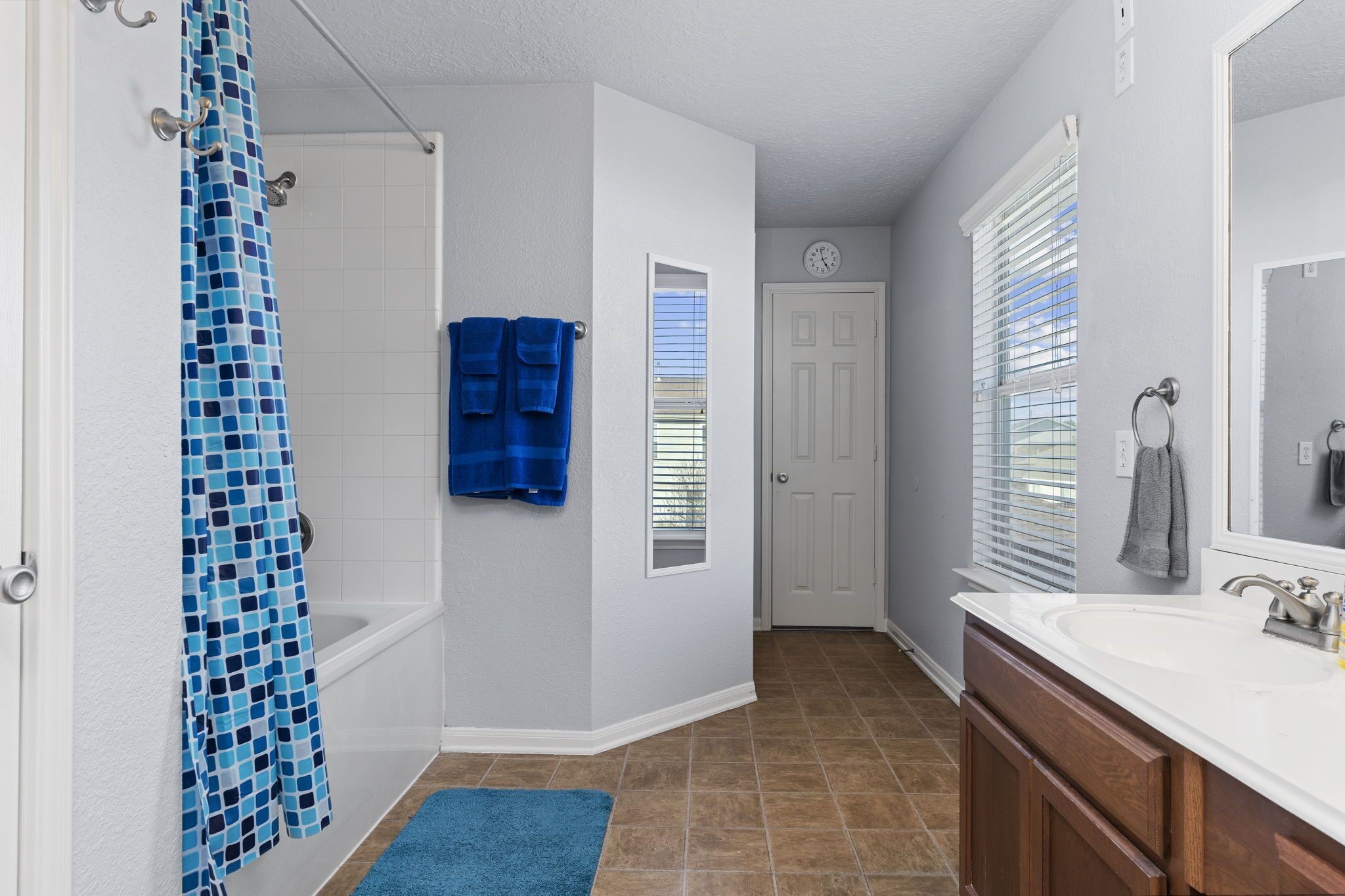 29326 Legends Green Drive Spring, TX 77386 - Photo 17 of 31 a bathroom with a sink a vanity and a shower