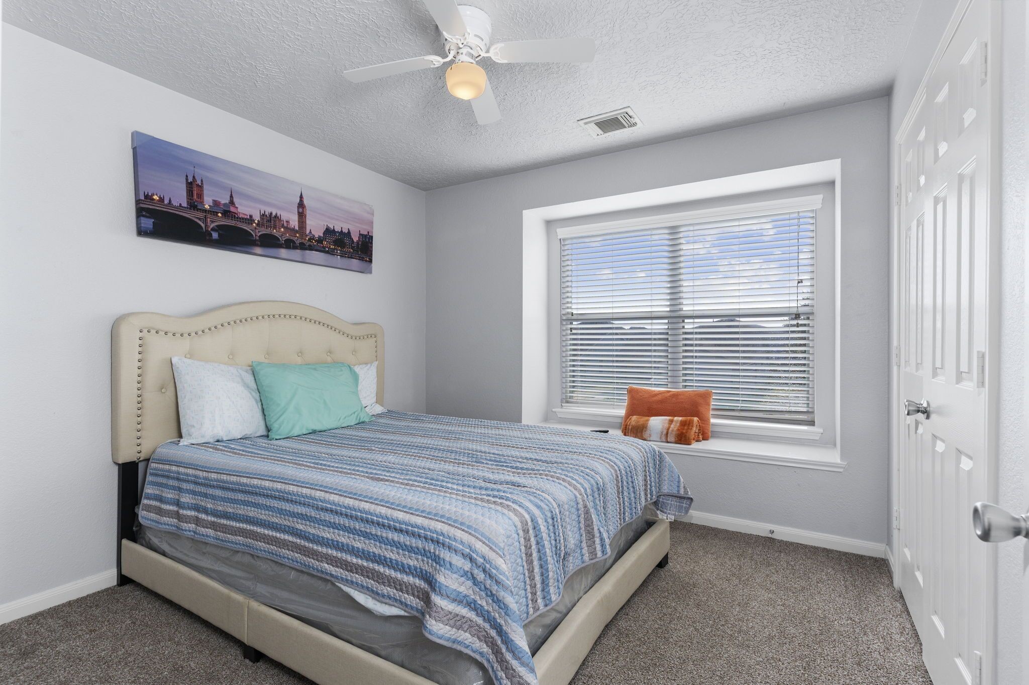 29326 Legends Green Drive Spring, TX 77386 - Photo 19 of 31 a bedroom with a bed and window