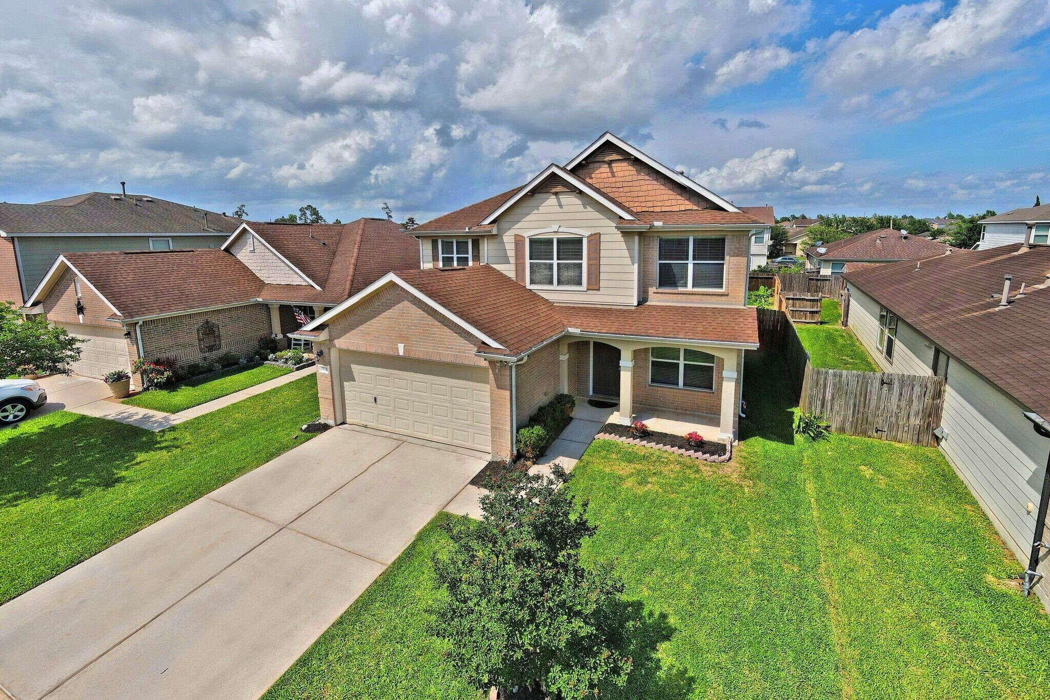29326 Legends Green Drive Spring, TX 77386 - Photo 2 of 31 a aerial view of a house with a yard