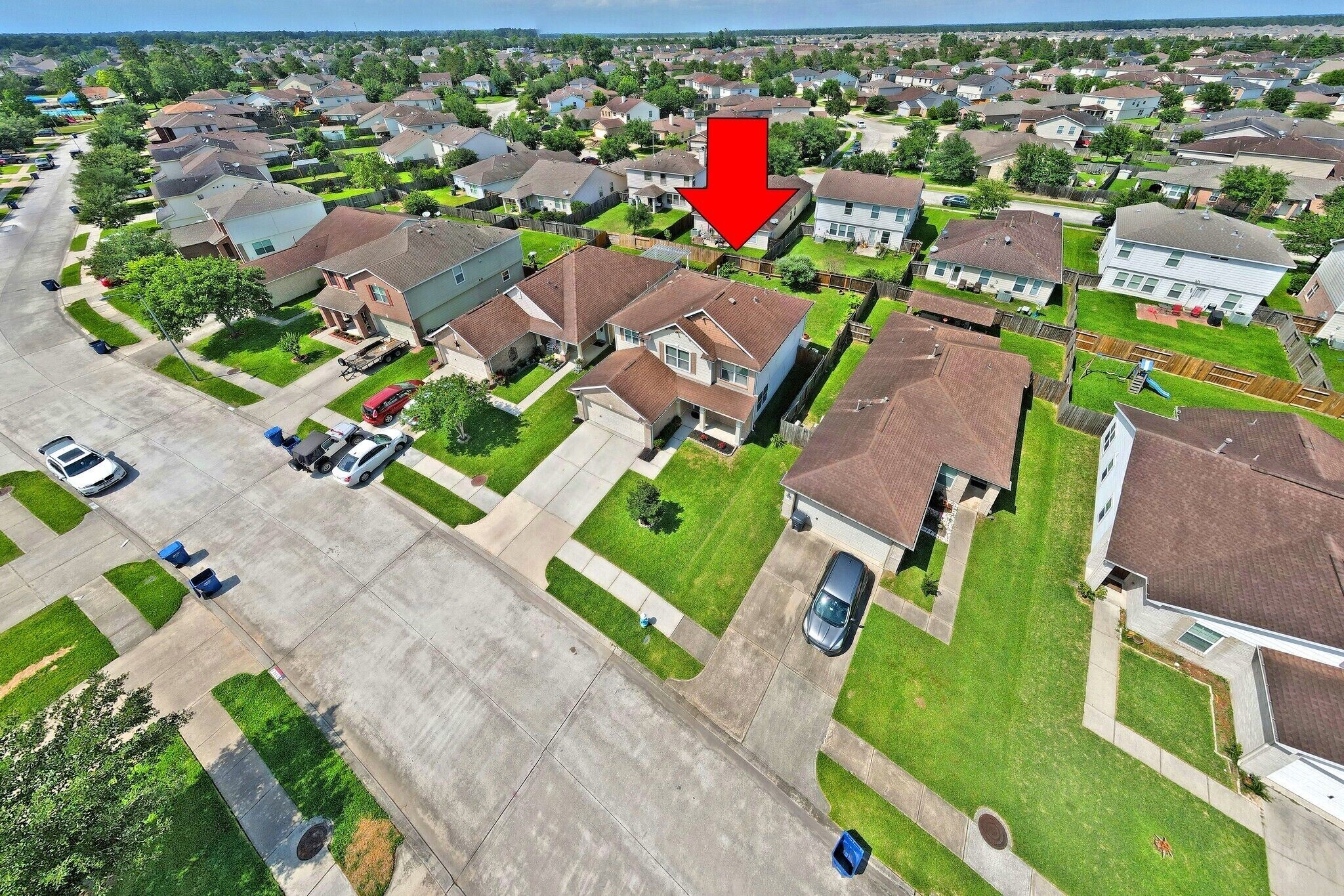 29326 Legends Green Drive Spring, TX 77386 - Photo 31 of 31 an aerial view of a house with a swimming pool yard and outdoor seating