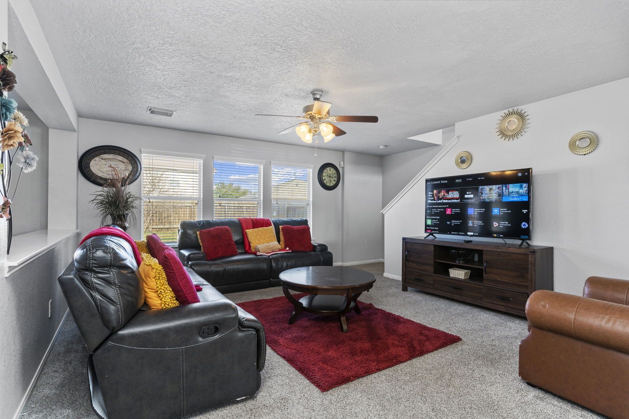 29326 Legends Green Drive Spring, TX 77386 - Photo 6 of 31 a living room with furniture a clock and a window