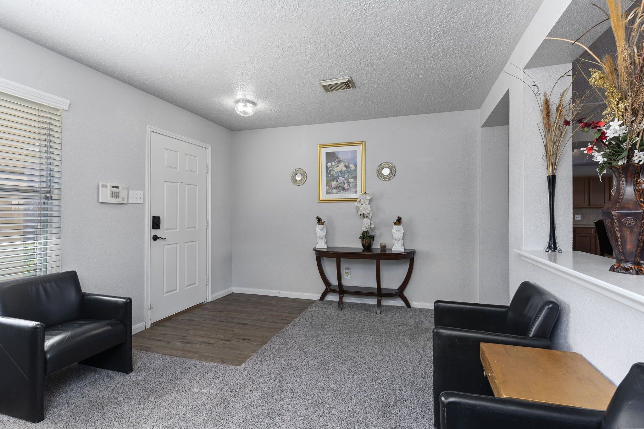 29326 Legends Green Drive Spring, TX 77386 - Photo 8 of 31 a living room with furniture and a potted plant