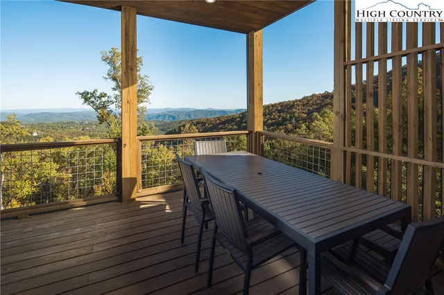 an outdoor view from balcony with seating space