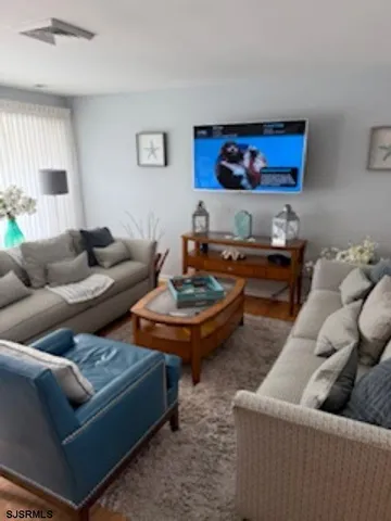a living room with furniture and a couch