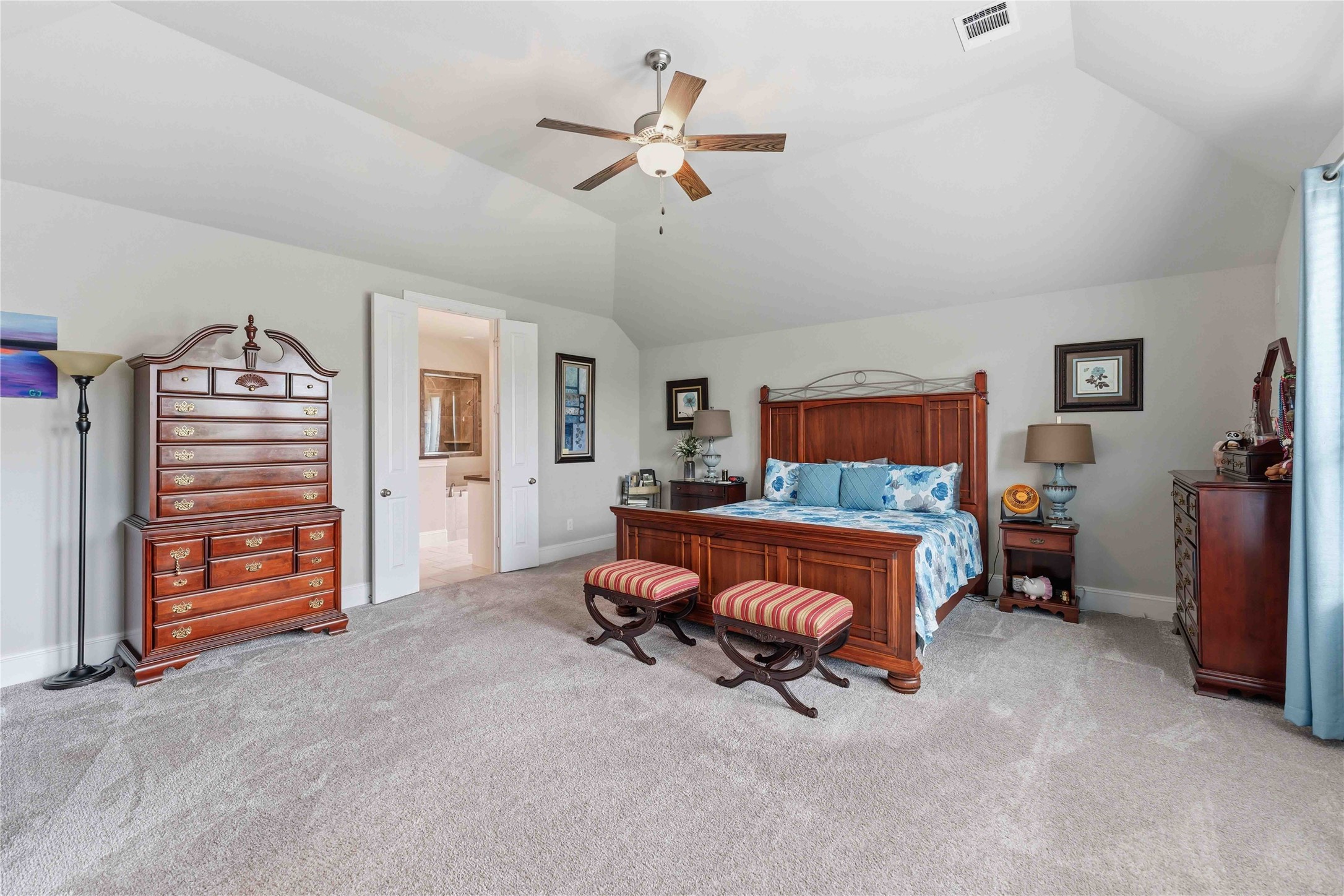 10127 Cooper's Hawk Way Conroe, TX 77385 - Photo 17 of 35 Primary bedroom with en suite bath with dual vanities, extra storage, a soaking sub, separate shower and large walk in closet