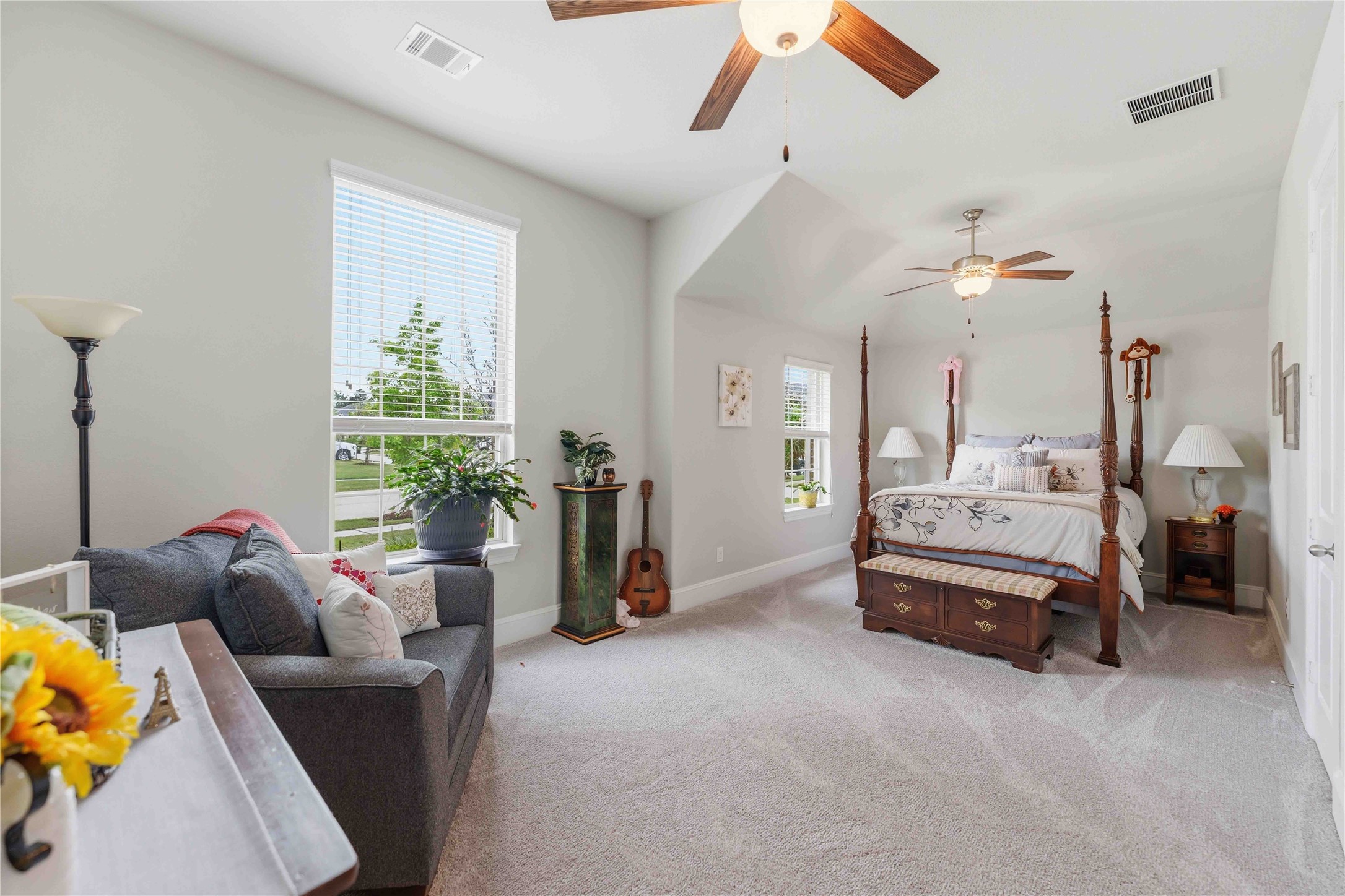 10127 Cooper's Hawk Way Conroe, TX 77385 - Photo 21 of 35 Oversized secondary bedroom is enough for a king bed and sitting area.