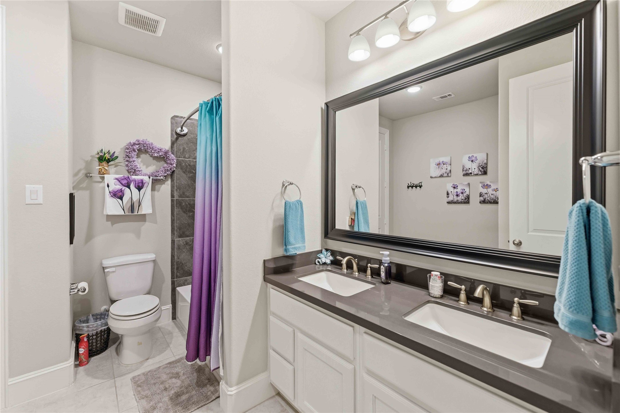 10127 Cooper's Hawk Way Conroe, TX 77385 - Photo 24 of 35 Secondary bedroom offers rare dual sinks....makes getting ready quick and convenient