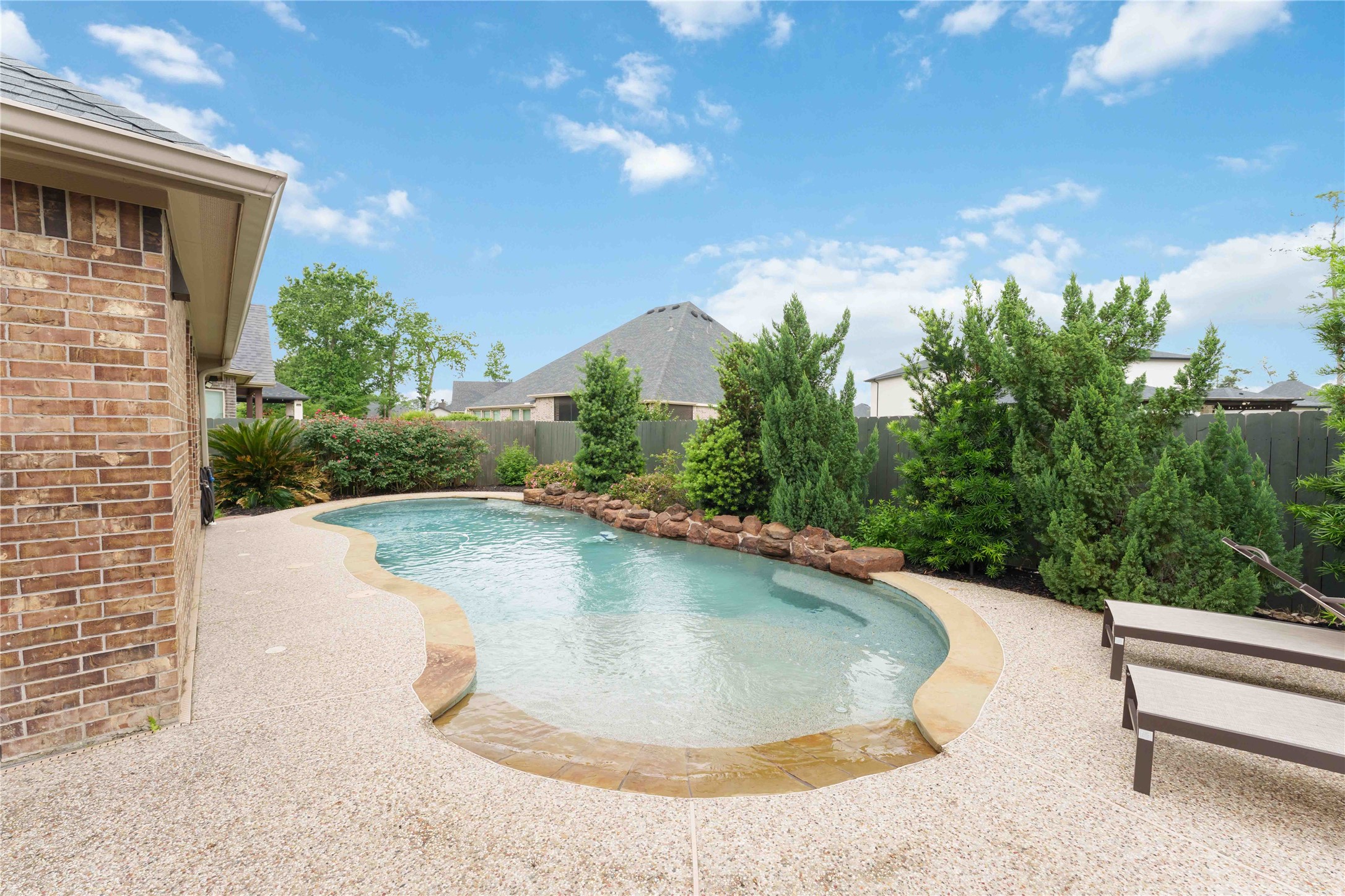 10127 Cooper's Hawk Way Conroe, TX 77385 - Photo 28 of 35 Sparkling zero entry pool with a chiller