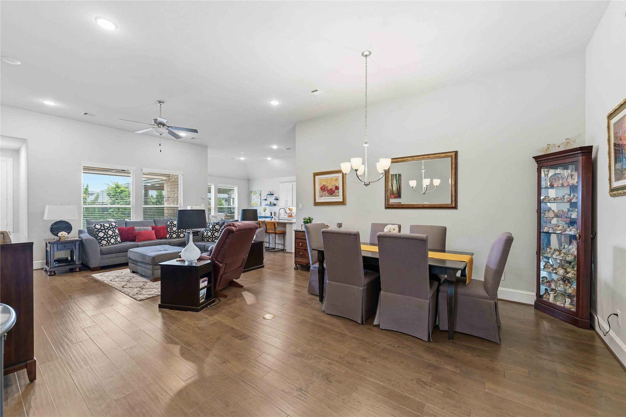 10127 Cooper's Hawk Way Conroe, TX 77385 - Photo 34 of 35 This open concept floorplan seemlessly blends living and dining space that is ideal for gathering