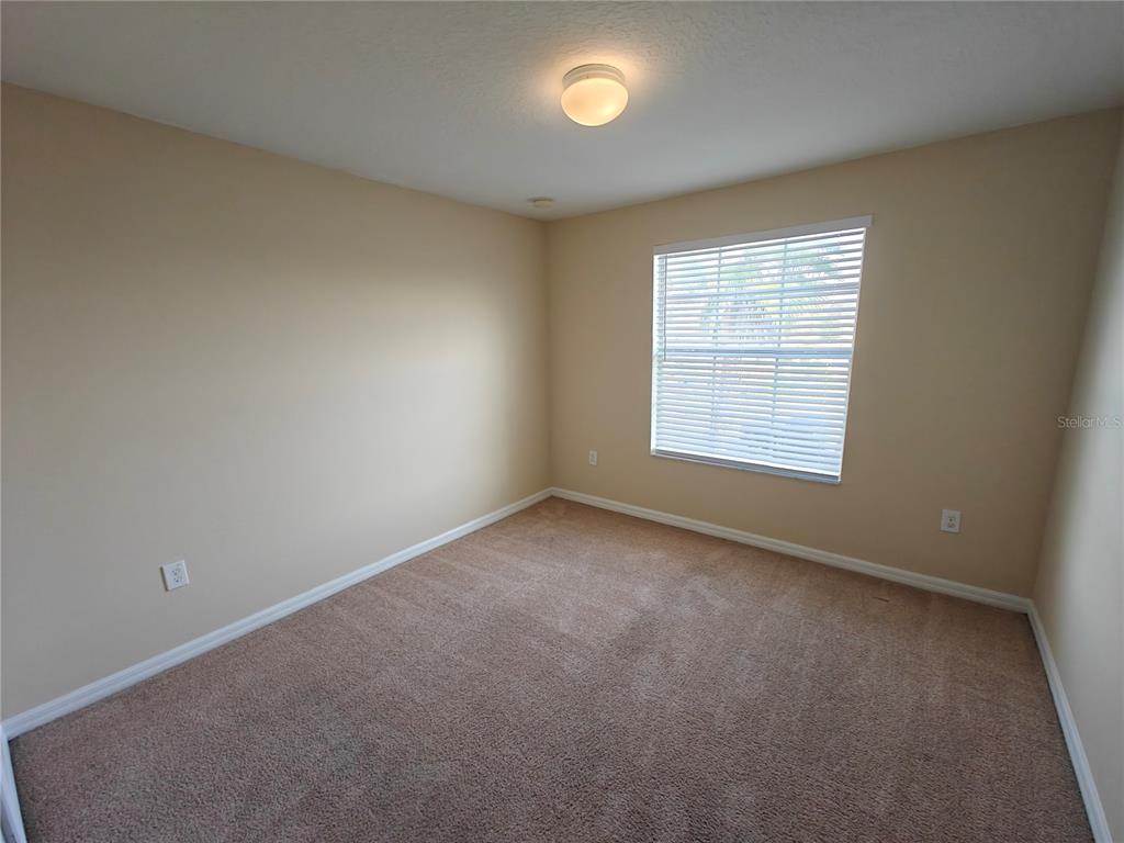 3410 Rodrick Circle Orlando, FL 32824 - Photo 16 of 27 an empty room with a window