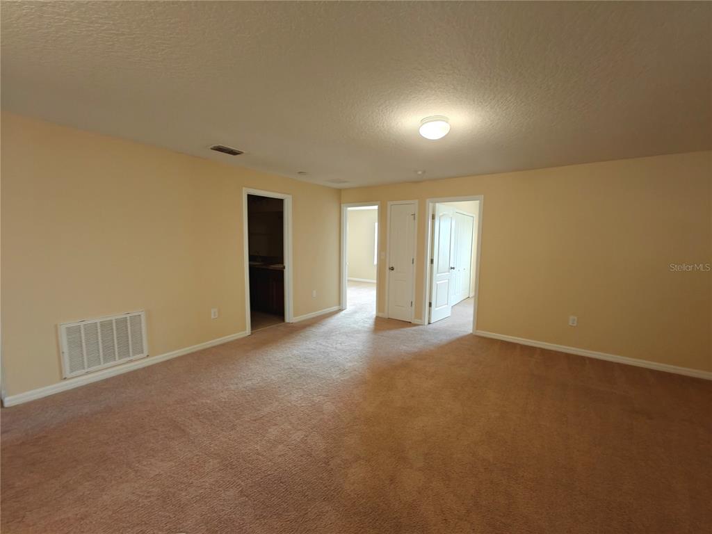 3410 Rodrick Circle Orlando, FL 32824 - Photo 21 of 27 a view of an empty room with a window