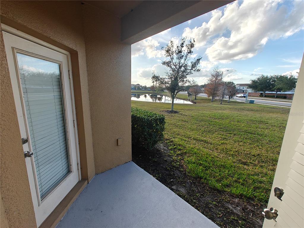 3410 Rodrick Circle Orlando, FL 32824 - Photo 25 of 27 a view of a yard from a balcony