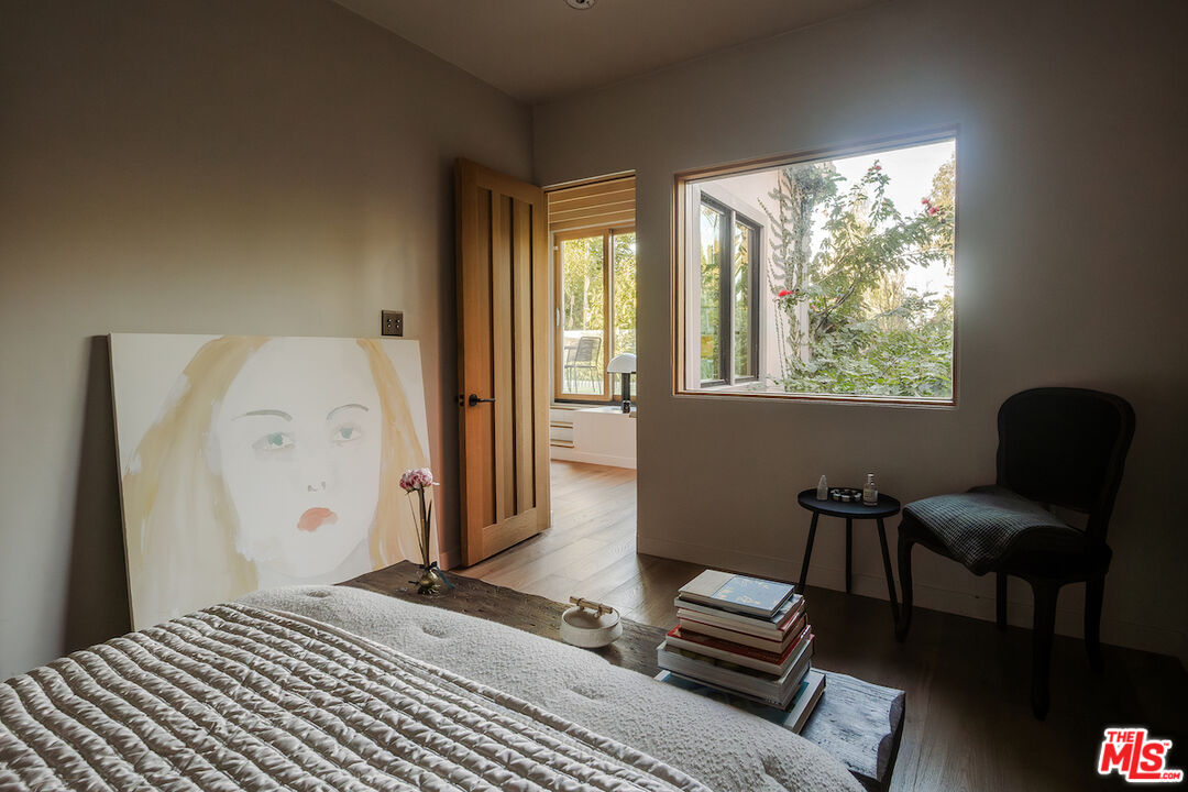 2139 Baxter Street Los Angeles, CA 90039 - Photo 19 of 55 a bedroom with a bed and wooden floor