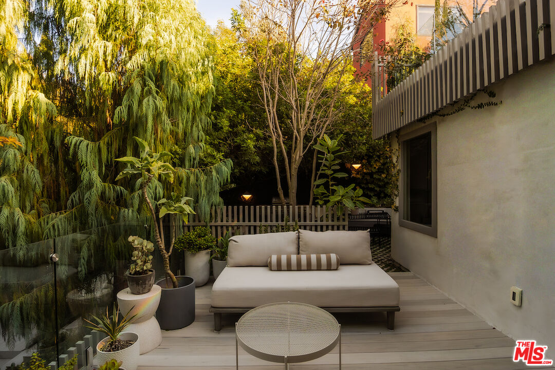 2139 Baxter Street Los Angeles, CA 90039 - Photo 27 of 55 a view of a patio with couches and potted plants