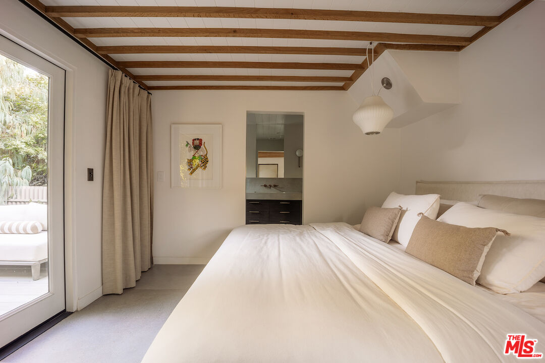 2139 Baxter Street Los Angeles, CA 90039 - Photo 29 of 55 a bedroom with a large bed and large window