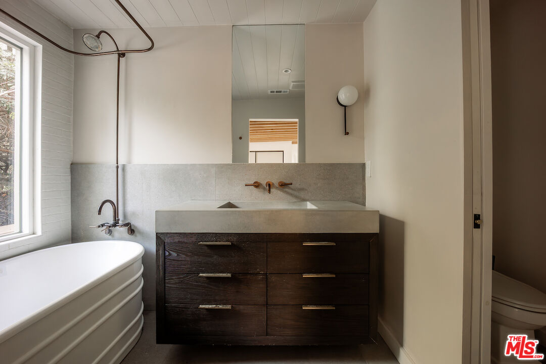 2139 Baxter Street Los Angeles, CA 90039 - Photo 30 of 55 a bathroom with a sink and a mirror