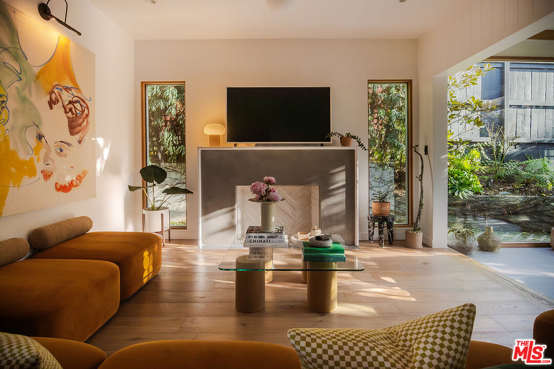 2139 Baxter Street Los Angeles, CA 90039 - Photo 3 of 55 a living room with fireplace furniture and a flat screen tv