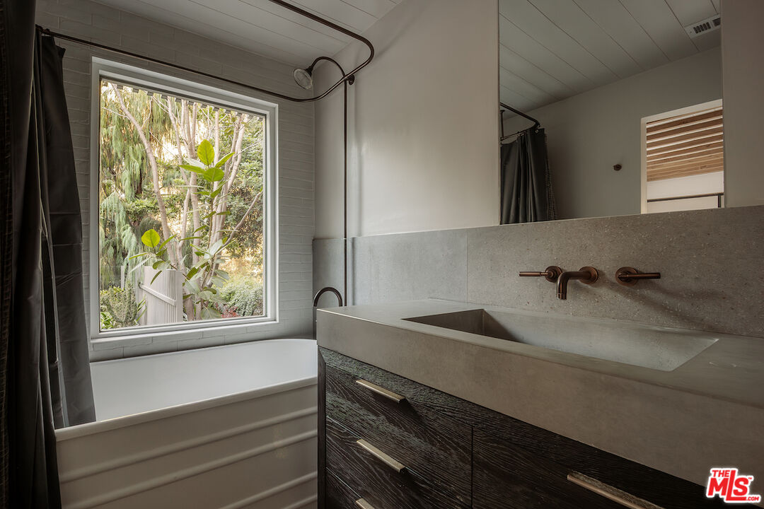 2139 Baxter Street Los Angeles, CA 90039 - Photo 31 of 55 a bathroom with a sink and a window