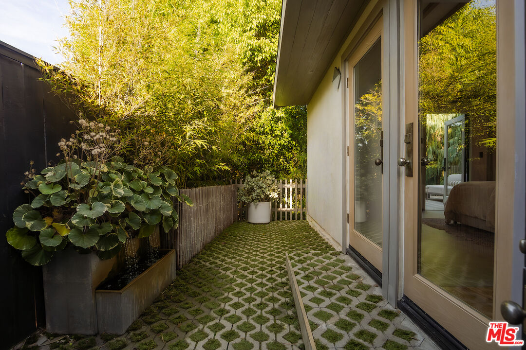 2139 Baxter Street Los Angeles, CA 90039 - Photo 33 of 55 a view of a porch with chairs and potted plants
