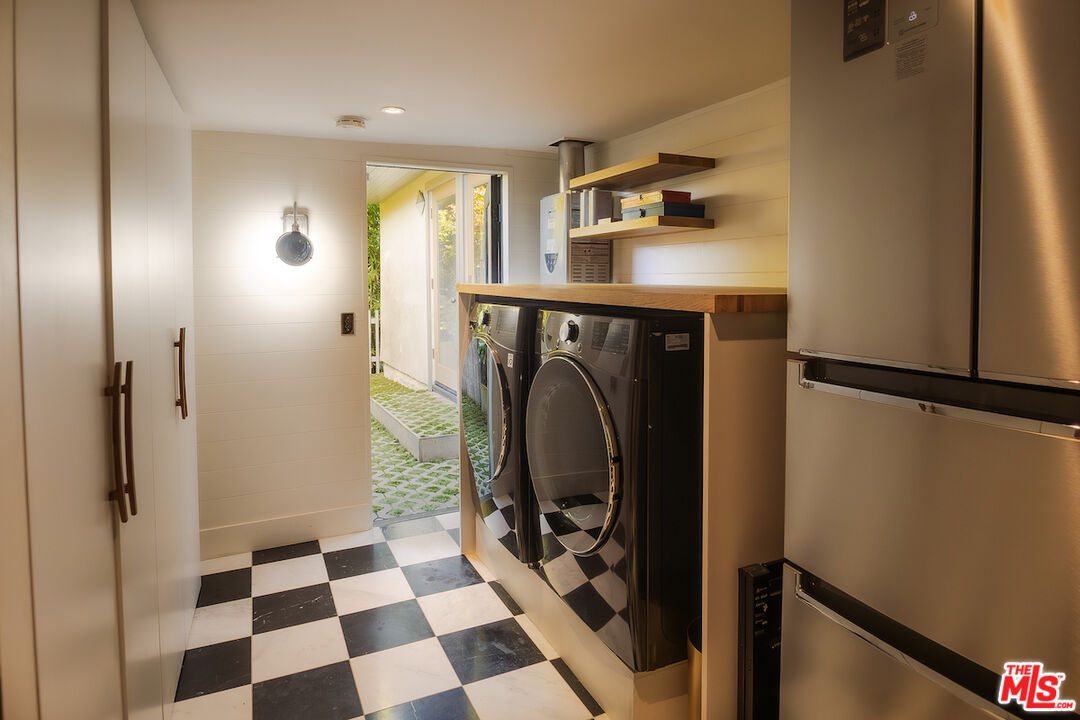 2139 Baxter Street Los Angeles, CA 90039 - Photo 34 of 55 a view of a storage and utility room with washer and dryer
