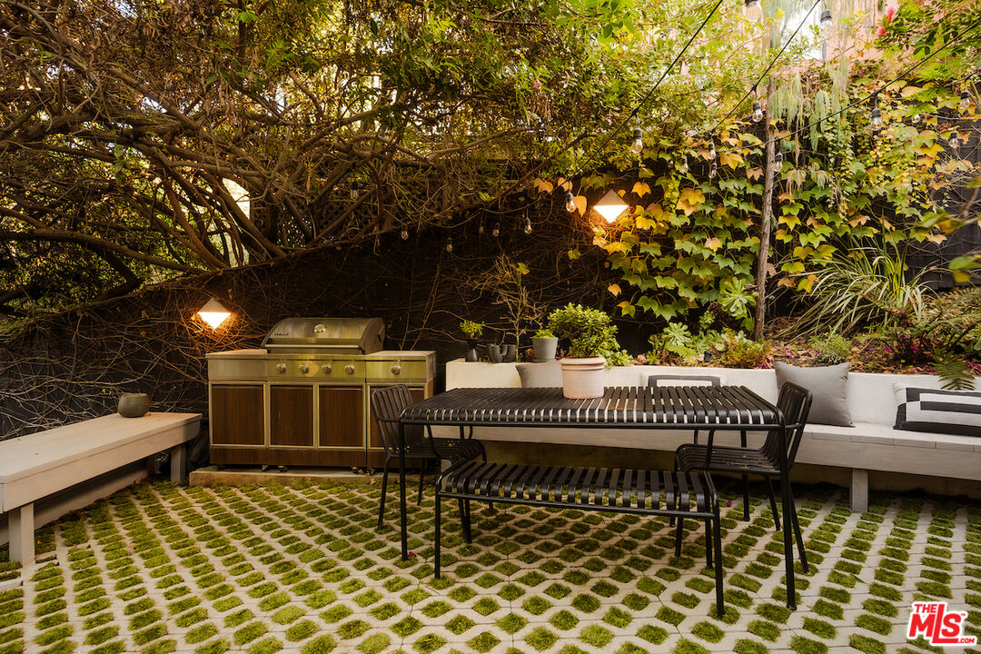 2139 Baxter Street Los Angeles, CA 90039 - Photo 41 of 55 a view of a patio with a table and chairs