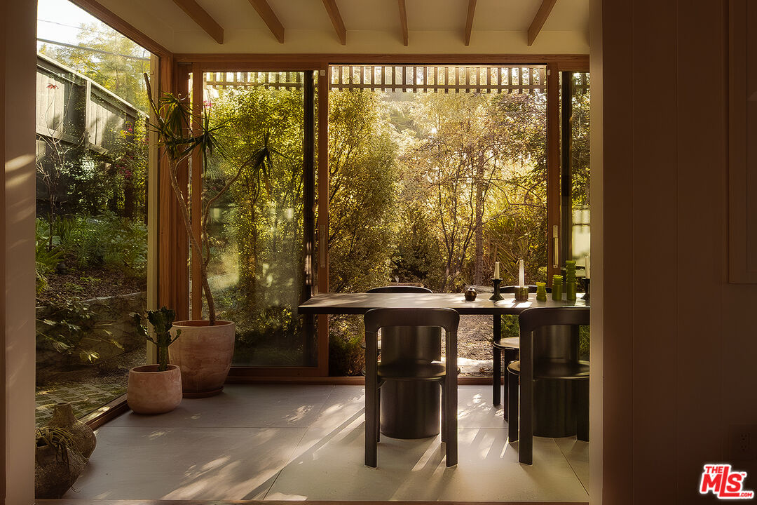 2139 Baxter Street Los Angeles, CA 90039 - Photo 7 of 55 a view of a porch with chairs and backyard