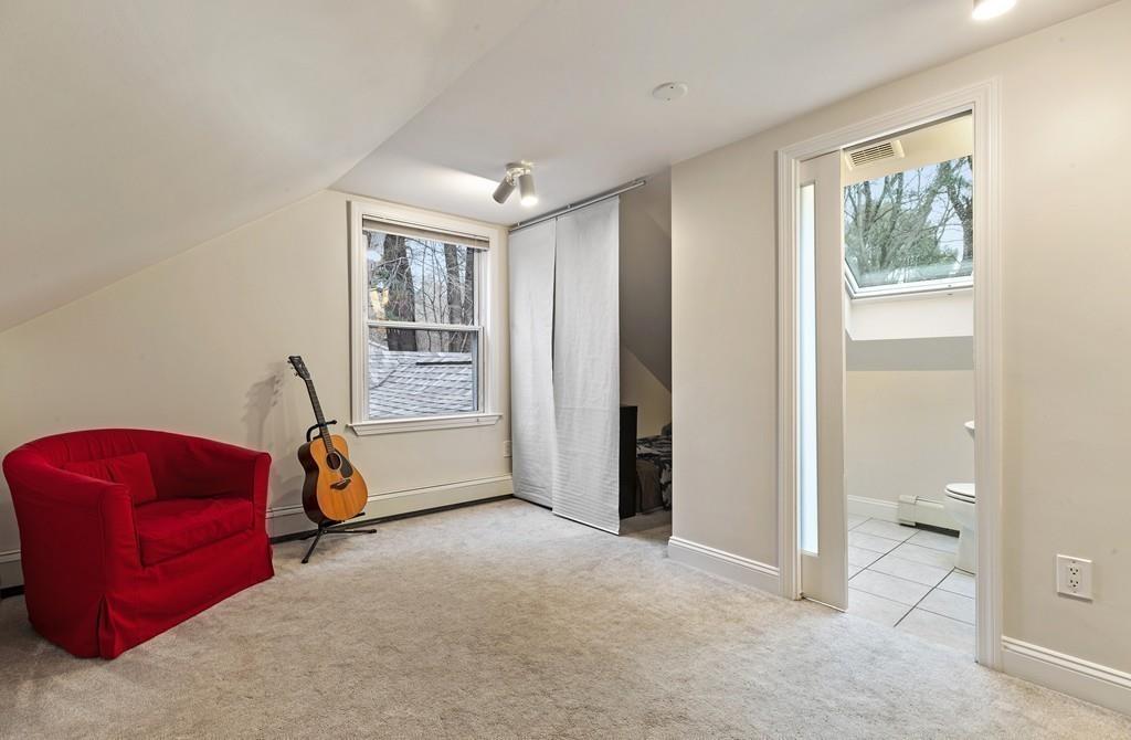 152 Boston Post Road Wayland, MA 01778 - Photo 17 of 25 a view of room with window and a couch