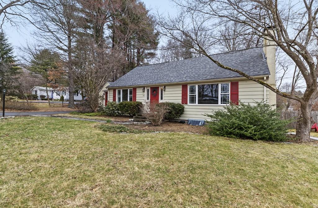 152 Boston Post Road Wayland, MA 01778 - Photo 24 of 25 a front view of a house with a yard