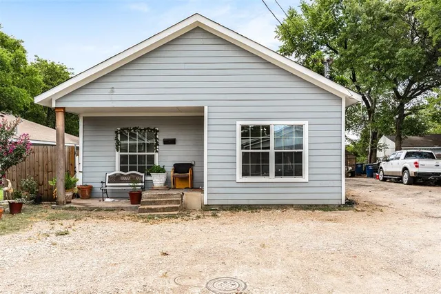 a front view of a house with a patio