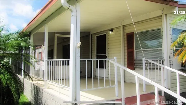 a kitchen with stainless steel appliances a refrigerator a sink a stove a counter space and cabinets