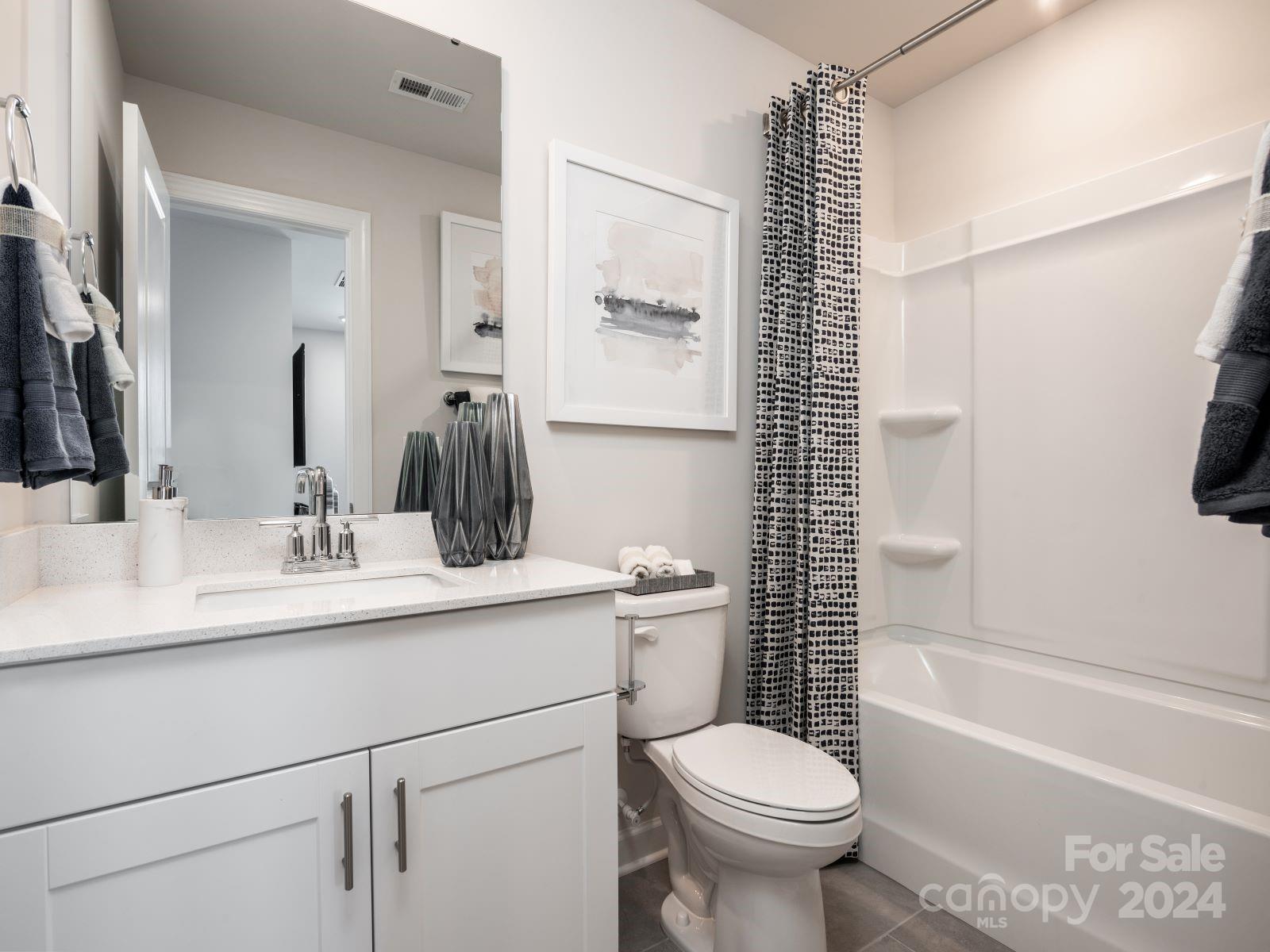 348 Cedar Knoll Circle Pineville, NC 28134 - Photo 12 of 19 a bathroom with a sink toilet tub and shower