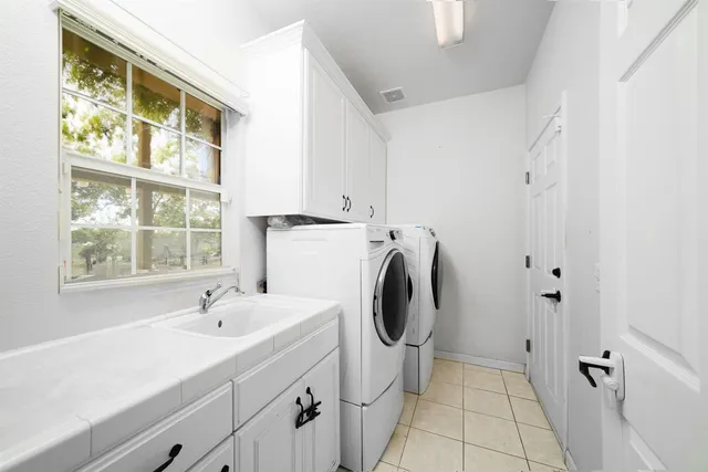 an outdoor space with furniture and garden