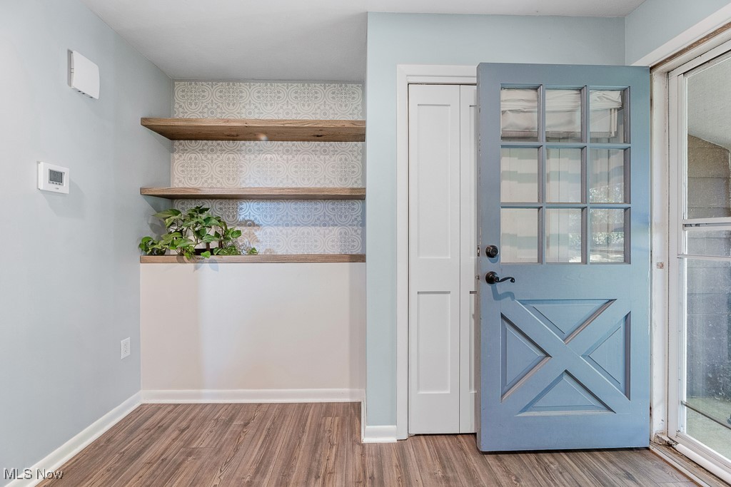 3166 Work Road Ravenna, OH 44266 - Photo 7 of 48 Doorway with hardwood / wood-style floors