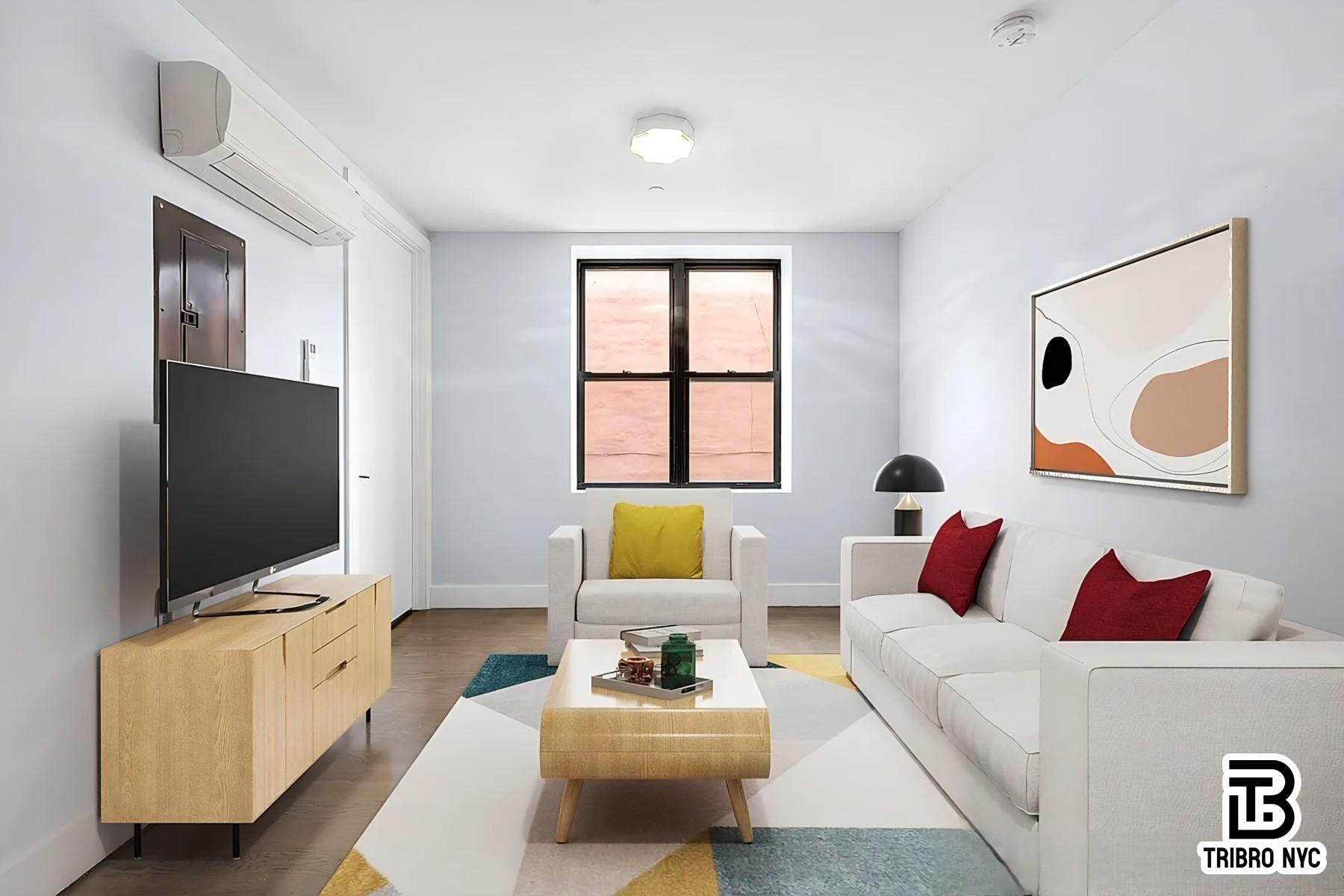 64 Stagg Street, Unit 4H Brooklyn, NY 11206 - Photo 1 of 7 a living room with furniture and a flat screen tv
