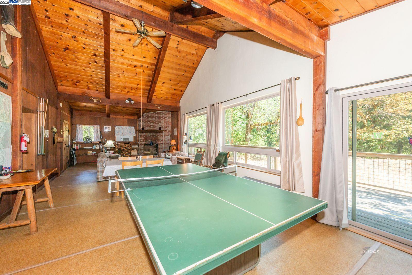 181 Price Creek Road Big Bar, CA 96010 - Photo 11 of 49 a room with lots of windows and tables