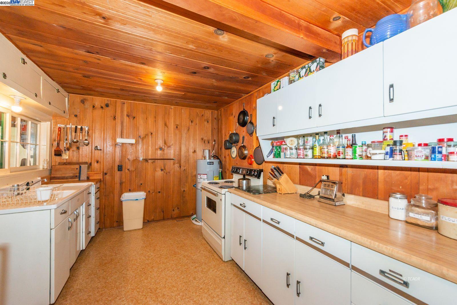181 Price Creek Road Big Bar, CA 96010 - Photo 13 of 49 a kitchen with sink and cabinets