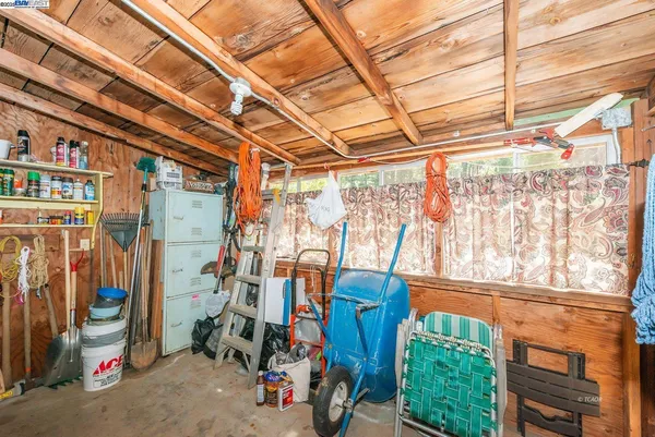 a view of swimming pool with a yard