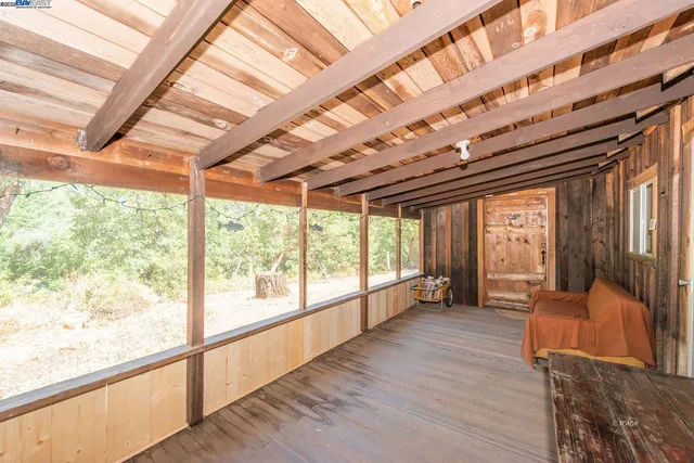 a view of a backyard of the house