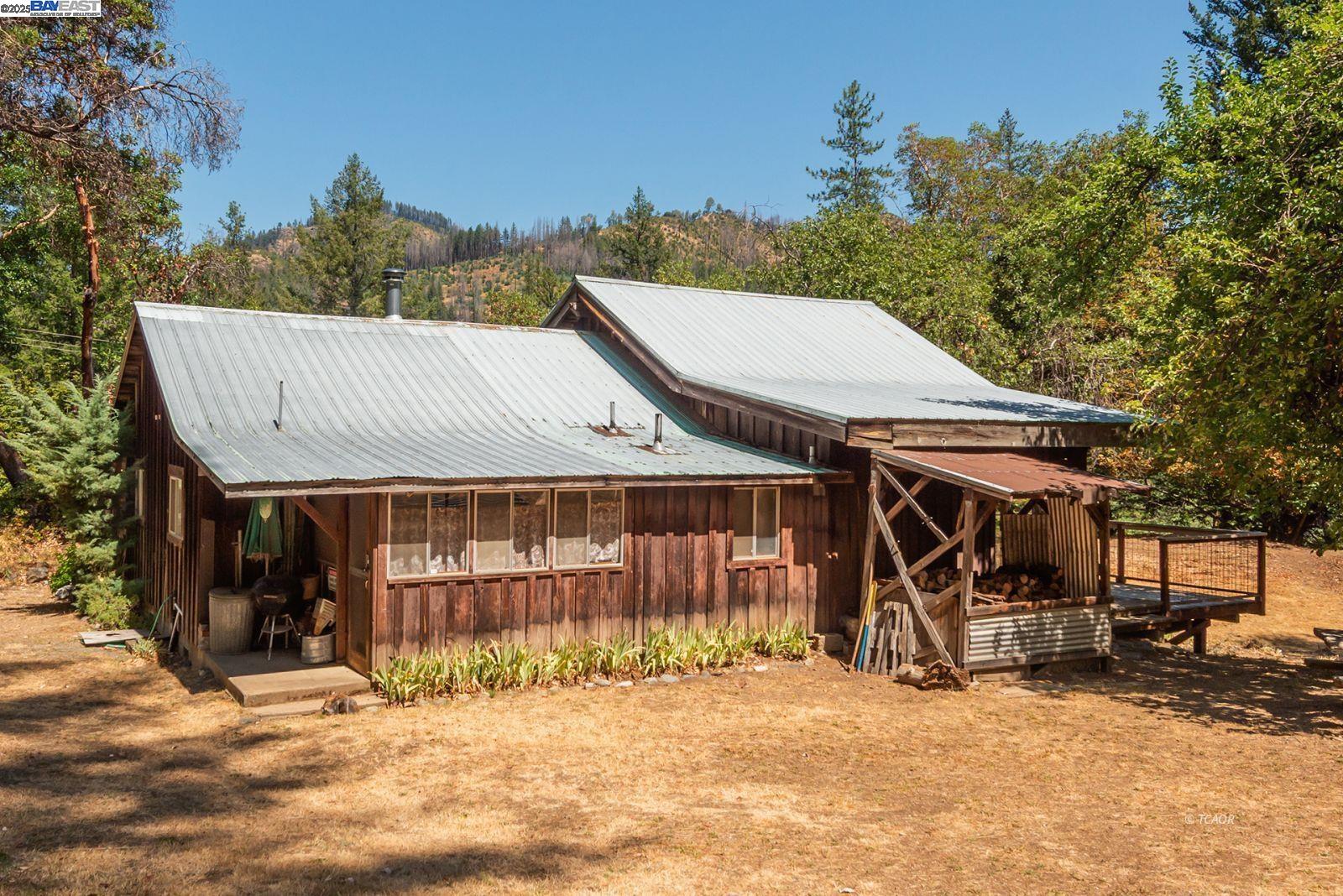 181 Price Creek Road Big Bar, CA 96010 - Photo 34 of 49 a view of a house with a outdoor space