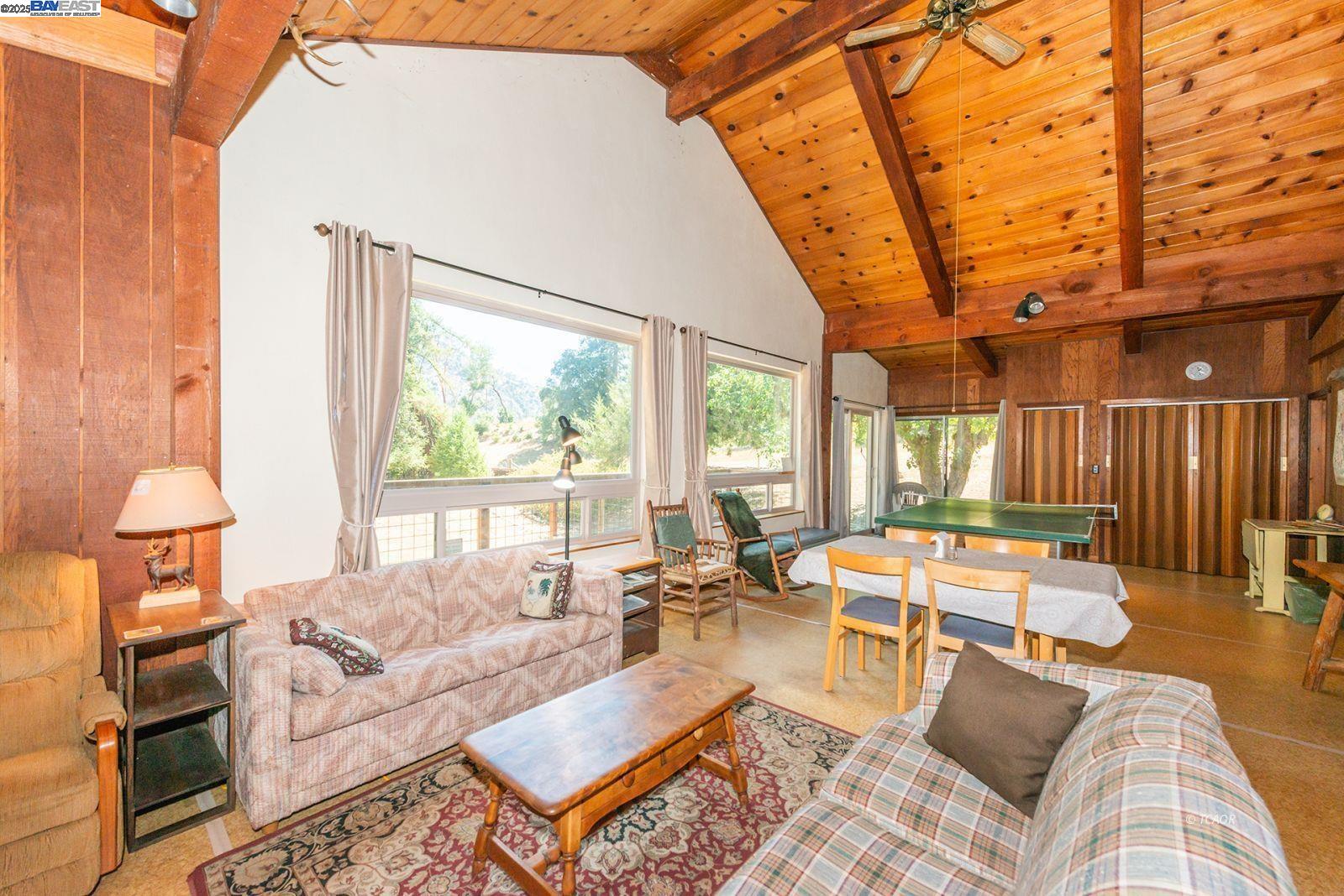 181 Price Creek Road Big Bar, CA 96010 - Photo 4 of 49 a living room with furniture and a large window