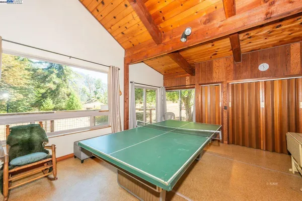 a kitchen with sink and cabinets